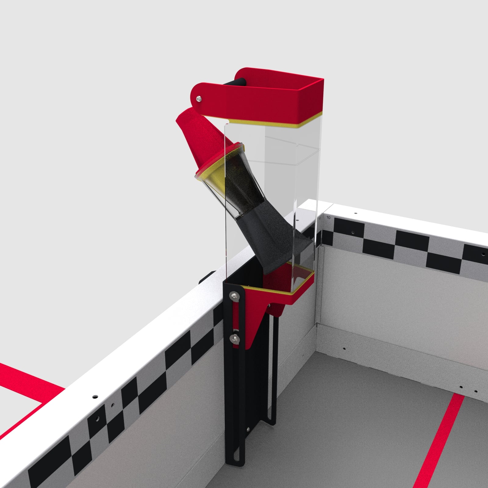 A close up view of the loader with a nested red/yellow pin and Cup being inserted at an angle through the back of the loader just above the field wall.